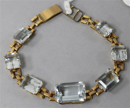 A Brazilian gold and aquamarine set bracelet, 6.5in.